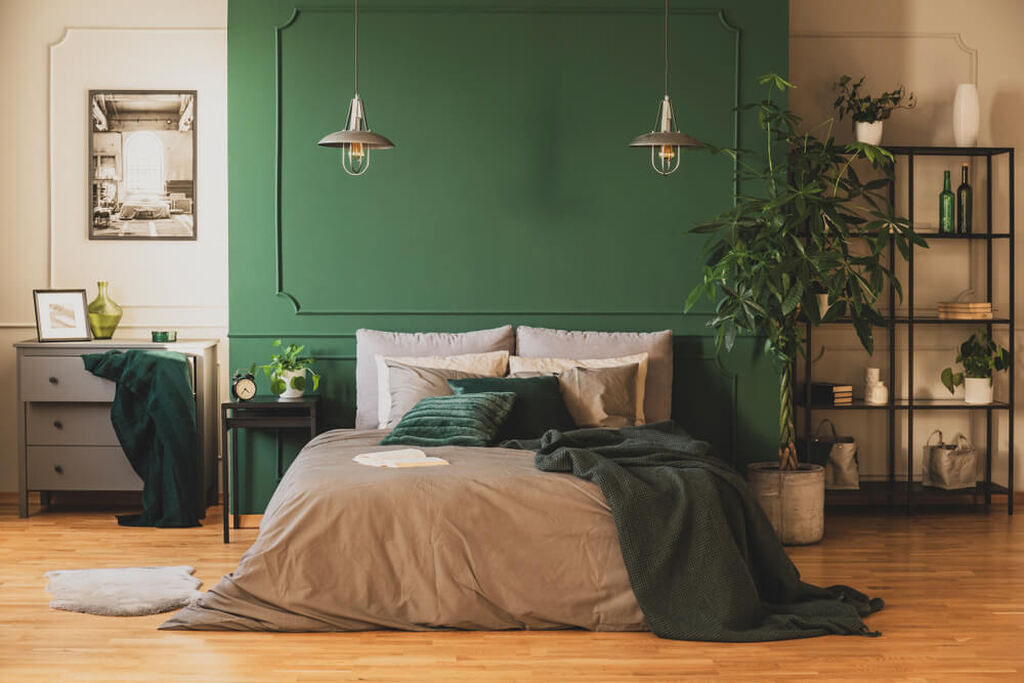 quarto pintado com tons de verde